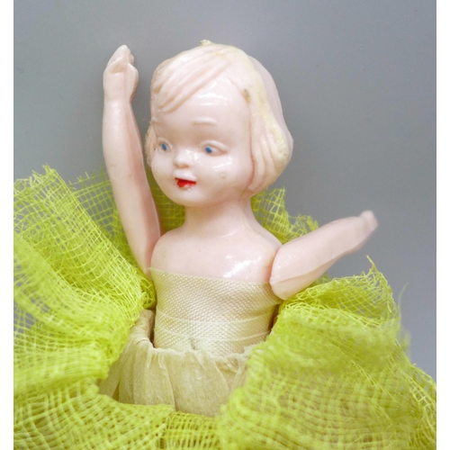 2049 - Thirteen small dolls, bisque including three marked made in Japan, celluloid and rubber