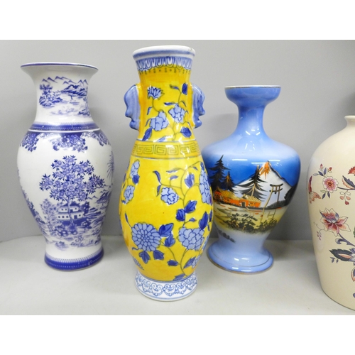 2098 - A collection of six vases including Wade