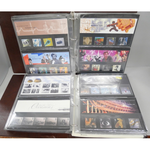 2106 - Stamps; a collection of approximately 235 Royal Mail Mint stamps in four albums, some duplicates