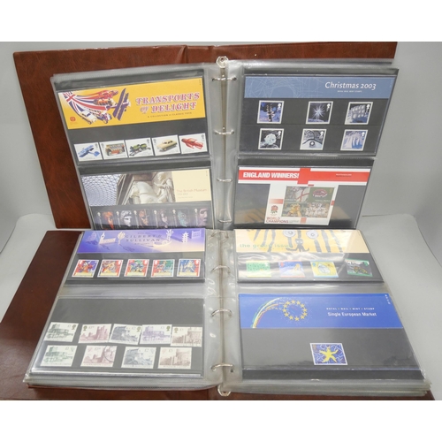 2106 - Stamps; a collection of approximately 235 Royal Mail Mint stamps in four albums, some duplicates