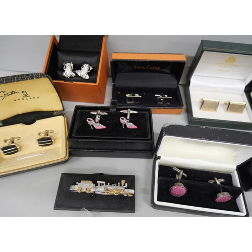 2156 - A collection of cufflinks and tie pins