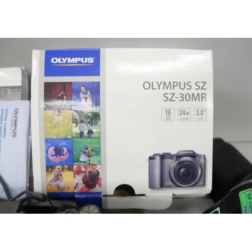 2164 - Two Olympus cameras, Olympus SZ boxed and Olympus digital camera C-300 zoom