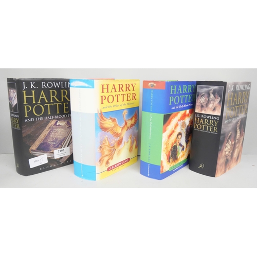 2165 - Four hardback first edition Harry Potter books by J K Rowling, two adult and two children's versions... 