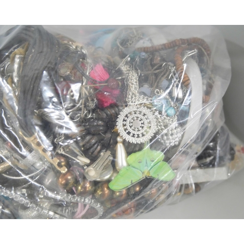 2188 - Three large bags of costume jewellery