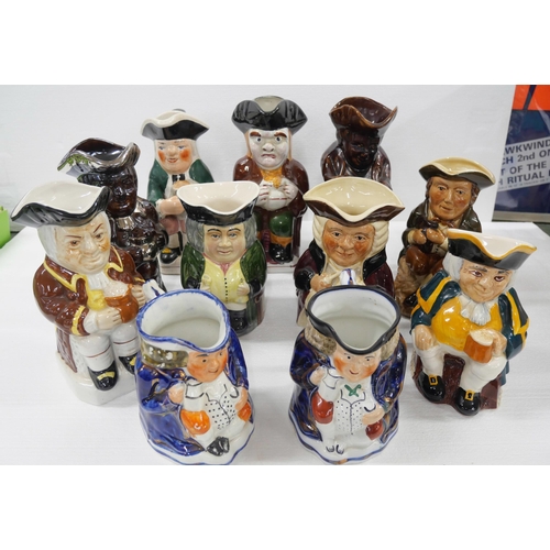 2191 - A large collection of Toby jugs, includes Royal Doulton 'Happy John', Tony Wood, Burlington Ware, Sy... 