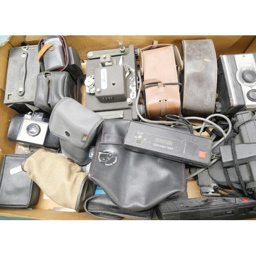 2193 - An extensive collection of vintage camera equipment including cameras, projectors, cine camera, trip... 