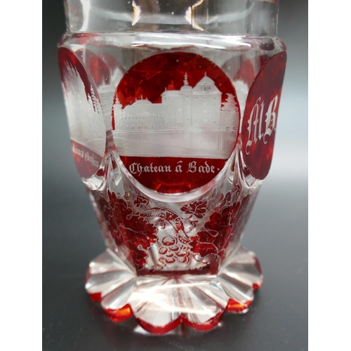 2207 - Two circa 1900s Bohemian spa ruby glasses, one with engraved panels (chip to base) and the other a s... 