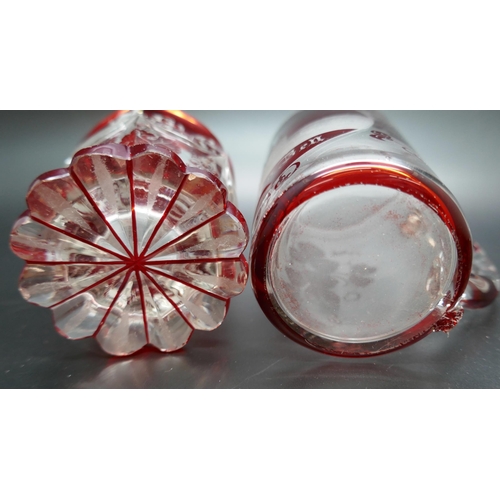 2207 - Two circa 1900s Bohemian spa ruby glasses, one with engraved panels (chip to base) and the other a s... 