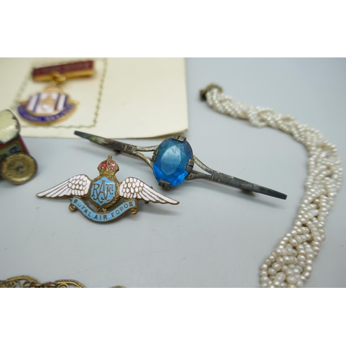 2221 - An RAF Sweetheart brooch, a Scottish brooch, a small tin toy, etc.