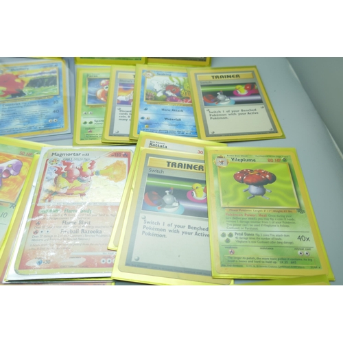 2224 - Thirty-four vintage Pokemon cards including first editions