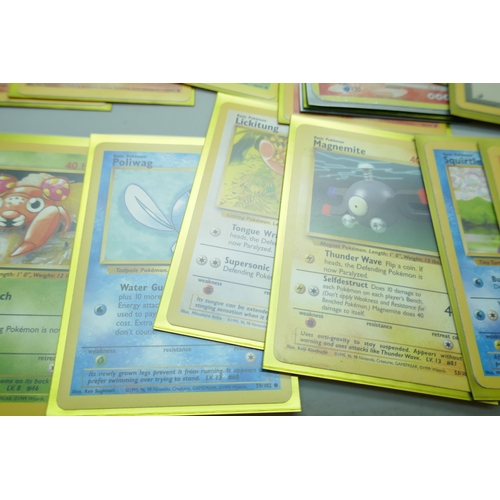 2224 - Thirty-four vintage Pokemon cards including first editions