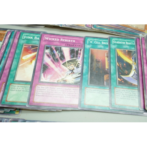 2231 - A collection of vintage yu-gi-oh and modern trading cards, over 250