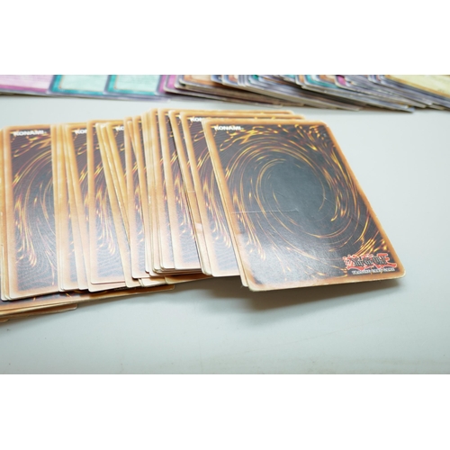 2231 - A collection of vintage yu-gi-oh and modern trading cards, over 250