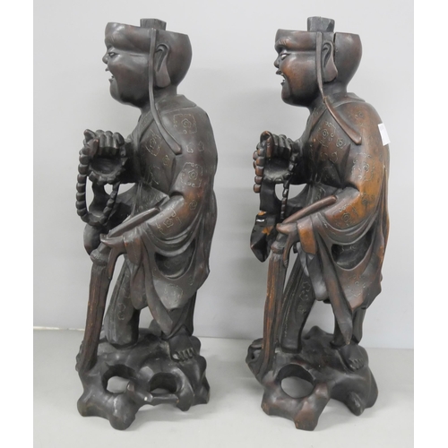 2261 - Two early 20th Century carved Laughing Buddha figures, 34cm