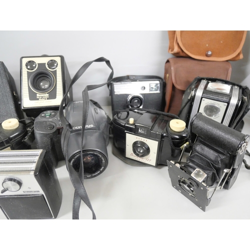 2264 - A collection of cameras including Olympus is-10 and early Kodak **PLEASE NOTE THIS LOT IS NOT ELIGIB... 