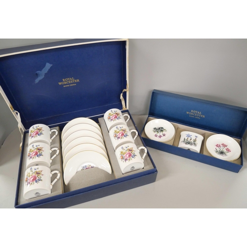 2266 - A collection of Royal Worcester bone china includes a boxed coffee set and a set with two trinket tr... 