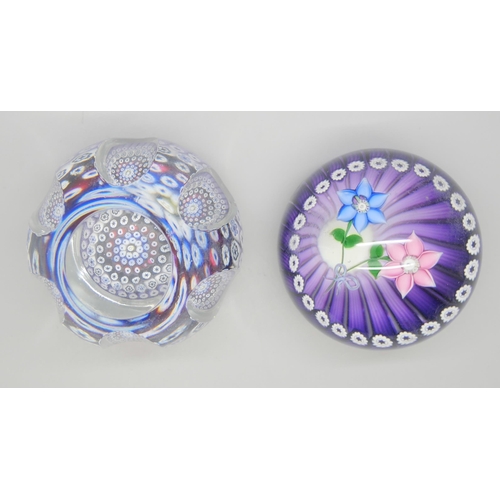 2294 - A 1980 Whitefriars multi-faceted spoke millefiori paperweight in colors of blue, white, and teal, an... 