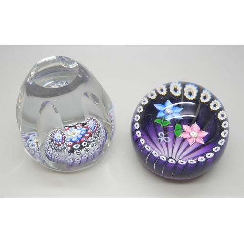 2294 - A 1980 Whitefriars multi-faceted spoke millefiori paperweight in colors of blue, white, and teal, an... 