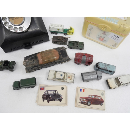 2312 - A collection of die-cast vehicles and a Bakelite telephone