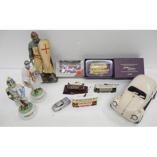 2319 - A mixed lot of porcelain, die cast vehicles and glass includes figures, jugs, a Beetle car, two Napo... 