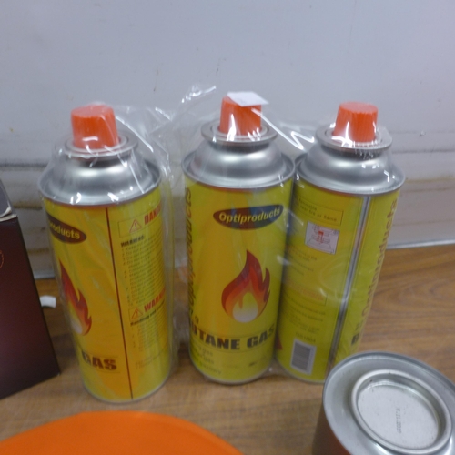 5032 - Quantity of camping related equipment including Flamos ethanol chafing fluid, disposable ponchos, an... 