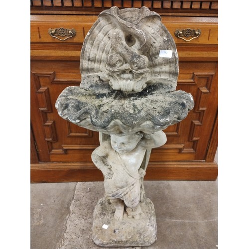 263 - An Italian style concrete figural bird bath