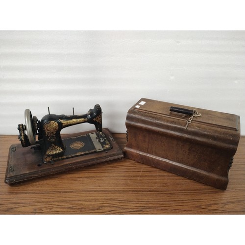 266 - A cased Jones sewing machine