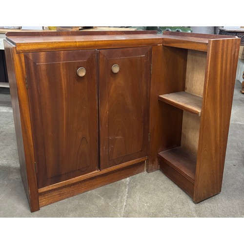 252A - A teak corner bookcase