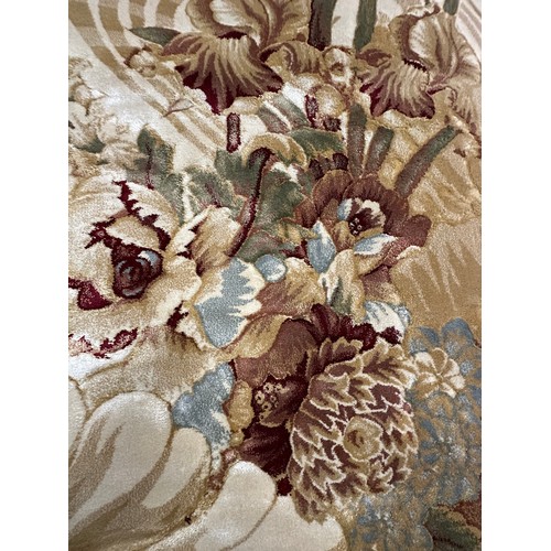 3034 - A full pile cashmere rug with an aubergine floral pattern