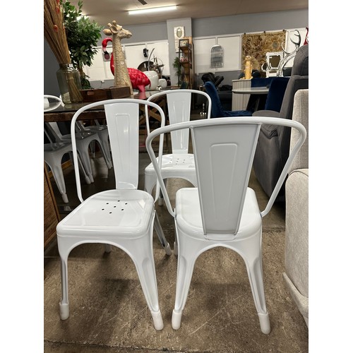 3102A - A set of six white metal dining chairs