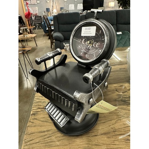 3110 - A barbers chair clock