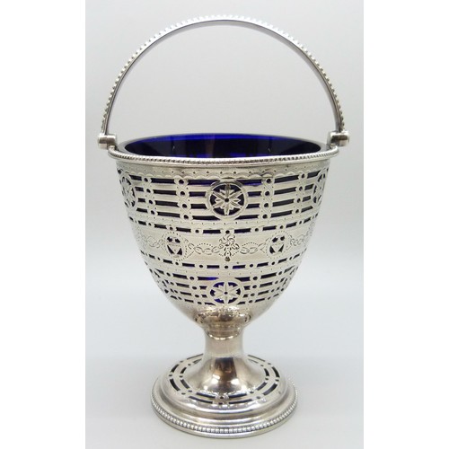 7240A - A white metal bright cut Georgian basket and blue glass liner, makers mark W.P., 113g