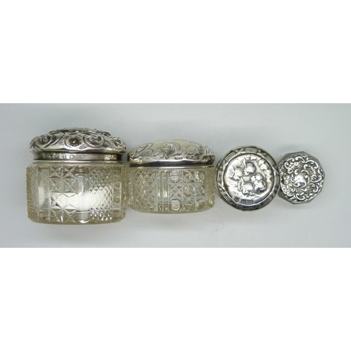 7245A - Four silver topped cut glass jars, Birmingham 1897, 1901, etc.