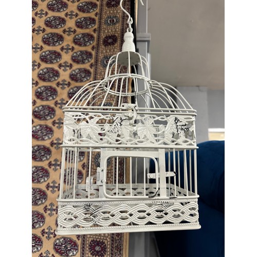 3133 - A set of bird cages