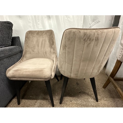 3166 - A set of three taupe velvet dining chairs *This lot is subject to VAT