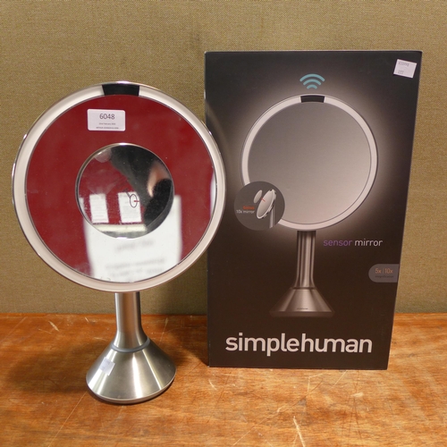 6048 - Simplehuman sensor mirror and Two AromaHome heat wraps (352-177) *This lot is subject to VAT