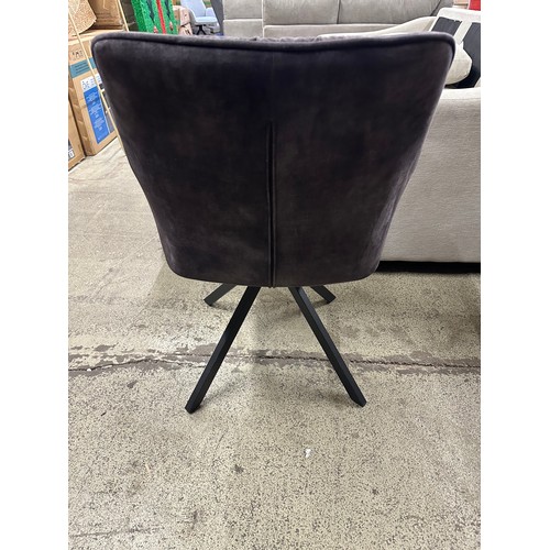 3278 - A dark grey velvet swivel dining chair *This lot is subject to VAT