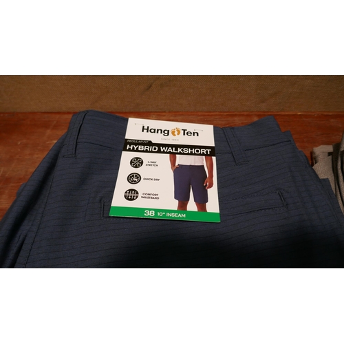 6335 - Hang Ten Hybrid walk shorts x 10, various colours and sizes, majority with tags *This lot is subject... 