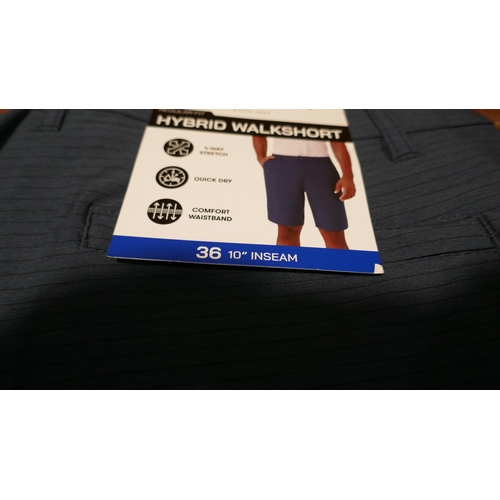 6335 - Hang Ten Hybrid walk shorts x 10, various colours and sizes, majority with tags *This lot is subject... 