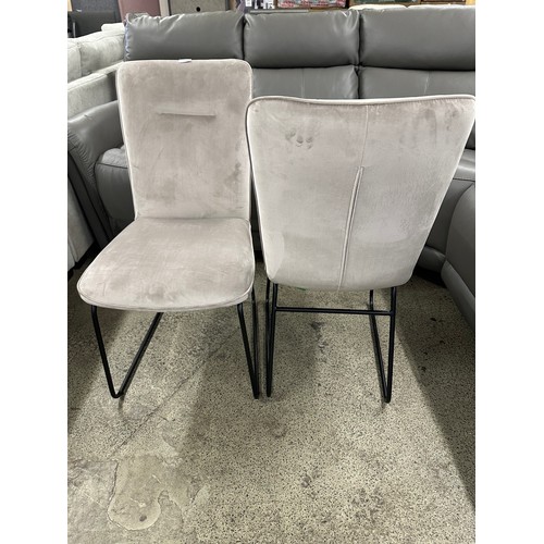 3309 - A pair of taupe velvet dining chairs *This lot is subject to VAT