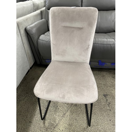 3309 - A pair of taupe velvet dining chairs *This lot is subject to VAT