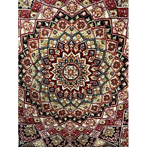 3025 - A fine woven full pile rich red ground unique floral pattern rug 230cm x 160cm