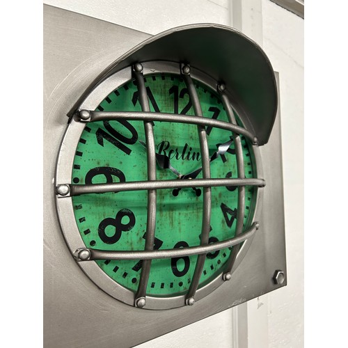 3027 - A metal traffic light wall clock and a brushed minimalist wall clock