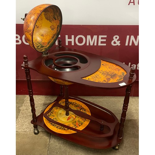 35 - An Italian style terrestrial globe cocktail cabinet/trolley