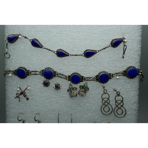 7197 - Two silver lapis lazuli bracelets, together with a collection of silver, silver plated and white met... 