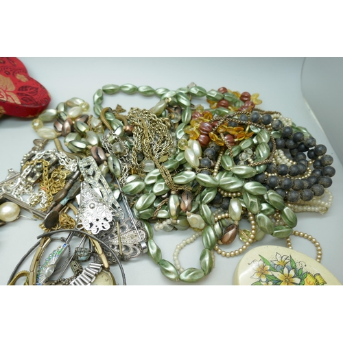 7208 - A collection of costume jewellery including bangles, a vesta case, a/f, necklaces, etc.