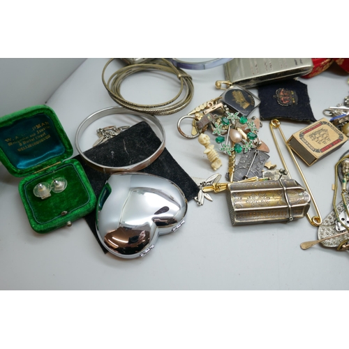 7208 - A collection of costume jewellery including bangles, a vesta case, a/f, necklaces, etc.