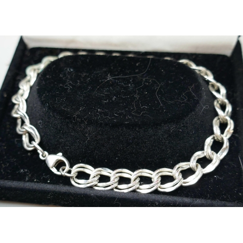 7210 - Three silver bracelets including an Ola Gorie example, 28g total