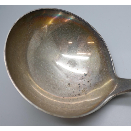 7311 - A large heavy silver ladle, Atkin Brothers, Sheffield 1931, 263g, 31cm