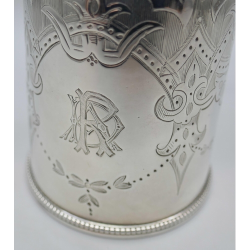 7313 - A Victorian silver mug with monogram and engraved detail, London 1866, 200g, 9.5cm